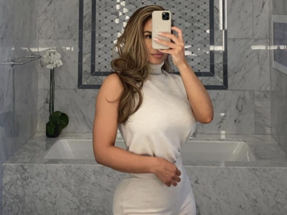 Here's 5 Shots Of 50 Cent's Former + Current Baes Slaying In Business Attire Daphne Joy
