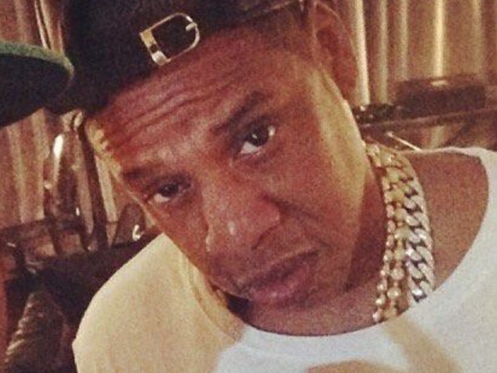 JAY-Z Spotted On Beach Working Out W/ Group Of People