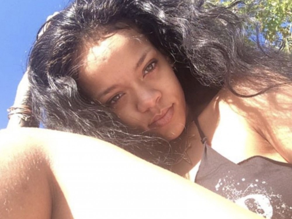 Rihanna Turns Reading Into Steamy Pool Pics Fun