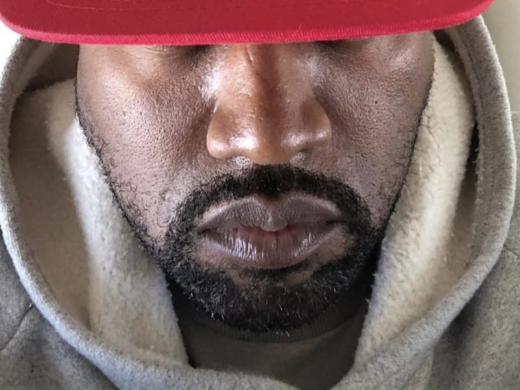 Kanye West wearing MAGA hat