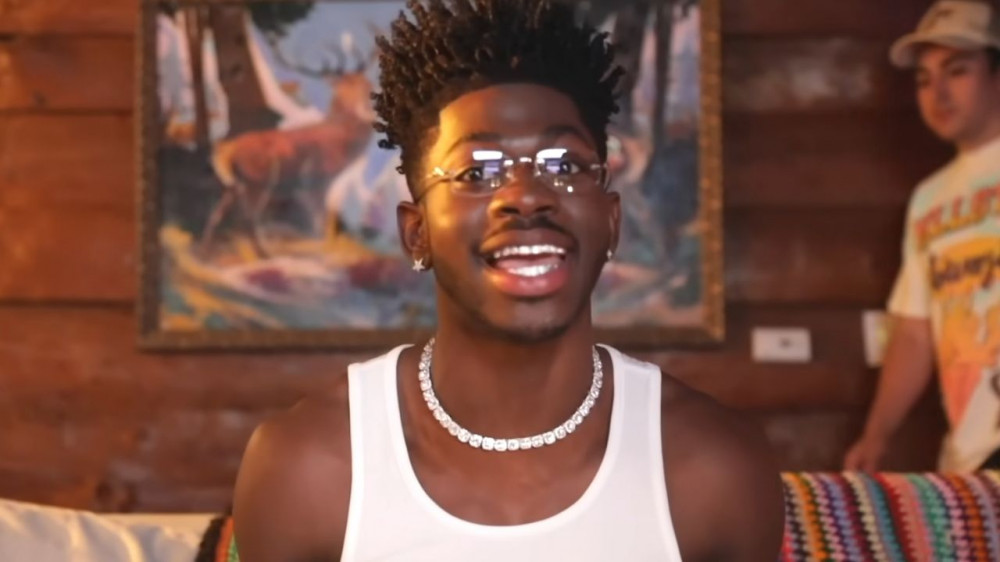 Lil Nas X Is Feeling Sexy And Unbothered As He Admires Himself + Orders Pizza For Haters