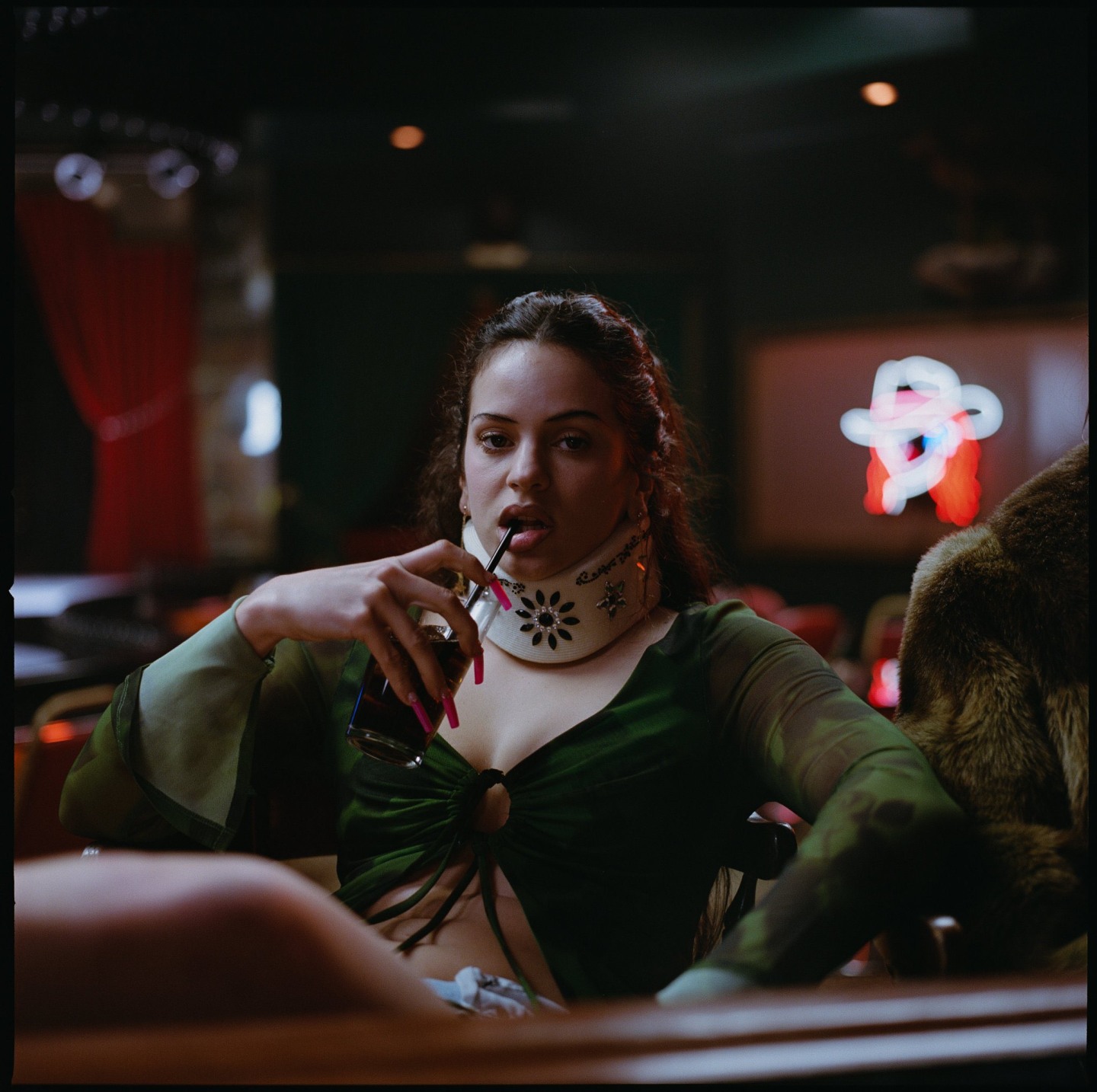 Behind Rosalía’s bedazzled neck brace and Euphoria’s mature new aesthetic